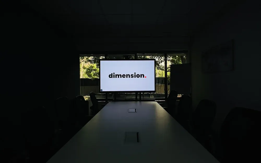 A real SAP training room with a large presentation screen