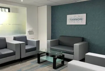 Waiting area lounge at Dimension SAP Training with comfortable seating